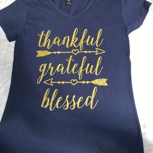 A navy and gold soft t shirt